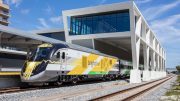 A Brightline train departs from the West Palm Beach station