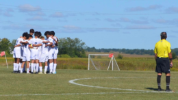 The team huddles before their game against Parkview Christian, which they would go on to win 7-0.