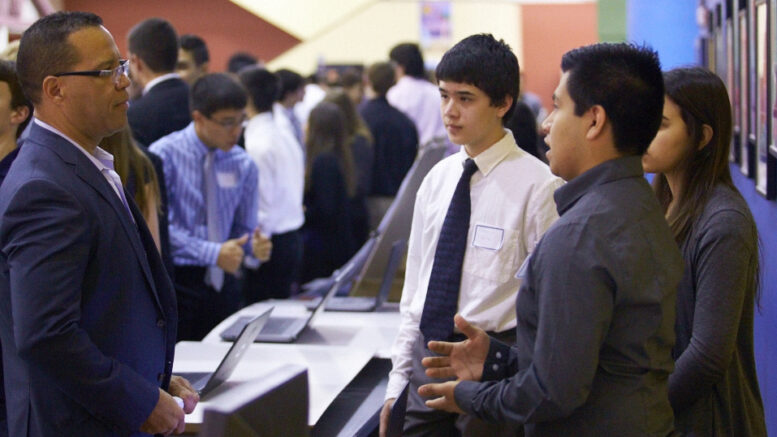 Students presenting at SLX.